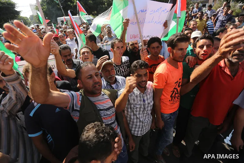 Palestinians of the Union of Agricultural Work Committees take part in a support of the Palestinian reconciliation, in Gaza city, on September 24, 2017. Palestinian President Mahmoud Abbas on Saturday said an announcemen...