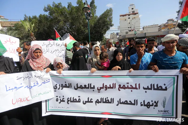 Palestinians of the Union of Agricultural Work Committees take part in a support of the Palestinian reconciliation, in Gaza city, on September 24, 2017. Palestinian President Mahmoud Abbas on Saturday said an announcemen...