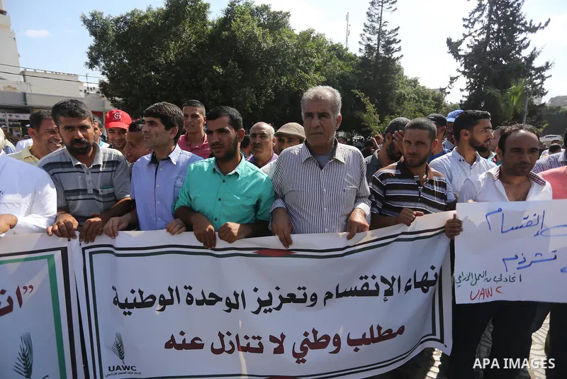 Palestinians of the Union of Agricultural Work Committees take part in a support of the Palestinian reconciliation, in Gaza city, on September 24, 2017. Palestinian President Mahmoud Abbas on Saturday said an announcemen...