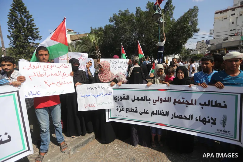 Palestinians of the Union of Agricultural Work Committees take part in a support of the Palestinian reconciliation, in Gaza city, on September 24, 2017. Palestinian President Mahmoud Abbas on Saturday said an announcemen...