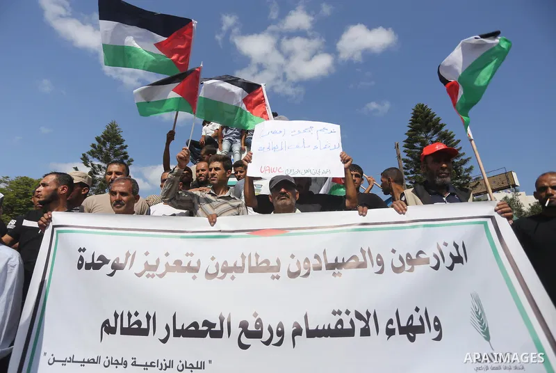 Palestinians of the Union of Agricultural Work Committees take part in a support of the Palestinian reconciliation, in Gaza city, on September 24, 2017. Palestinian President Mahmoud Abbas on Saturday said an announcemen...