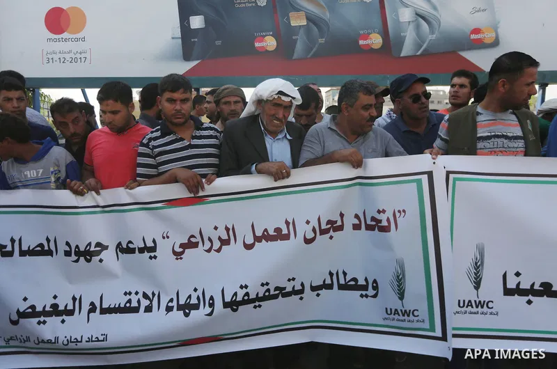 Palestinians of the Union of Agricultural Work Committees take part in a support of the Palestinian reconciliation, in Gaza city, on September 24, 2017. Palestinian President Mahmoud Abbas on Saturday said an announcemen...