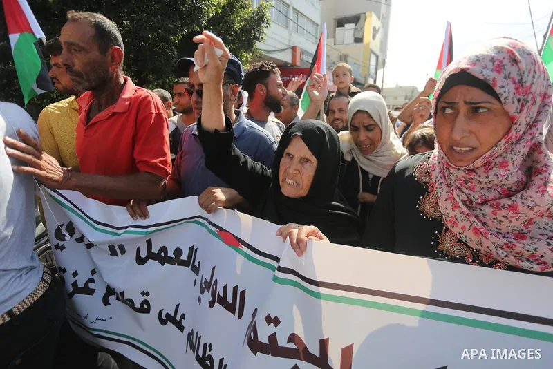 Palestinians of the Union of Agricultural Work Committees take part in a support of the Palestinian reconciliation, in Gaza city, on September 24, 2017. Palestinian President Mahmoud Abbas on Saturday said an announcemen...