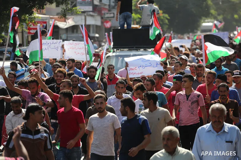 Palestinians of the Union of Agricultural Work Committees take part in a support of the Palestinian reconciliation, in Gaza city, on September 24, 2017. Palestinian President Mahmoud Abbas on Saturday said an announcemen...