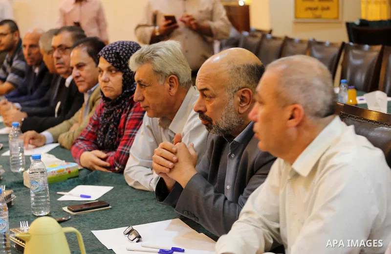 leaders of Palestinian factions attend a meeting with Hamas Chief Ismail Haniyeh and Yahya Sinwar the new leader of the Hamas Islamist movement in the Gaza Strip, in Gaza City on September 25, 2017. Photo by Mohammed Asa...