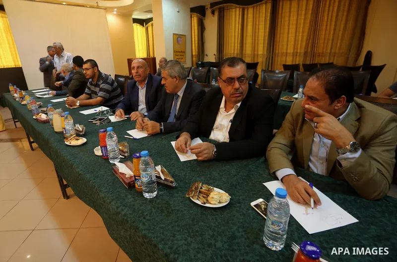 leaders of Palestinian factions attend a meeting with Hamas Chief Ismail Haniyeh and Yahya Sinwar the new leader of the Hamas Islamist movement in the Gaza Strip, in Gaza City on September 25, 2017. Photo by Mohammed Asa...