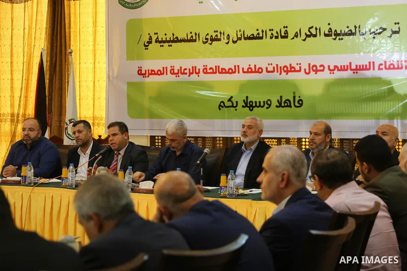 Hamas Chief Ismail Haniyeh and Yahya Sinwar the new leader of the Hamas Islamist movement in the Gaza Strip attend a meeting with leaders of Palestinian factions in Gaza City on September 25, 2017. Photo by Mohammed Asad