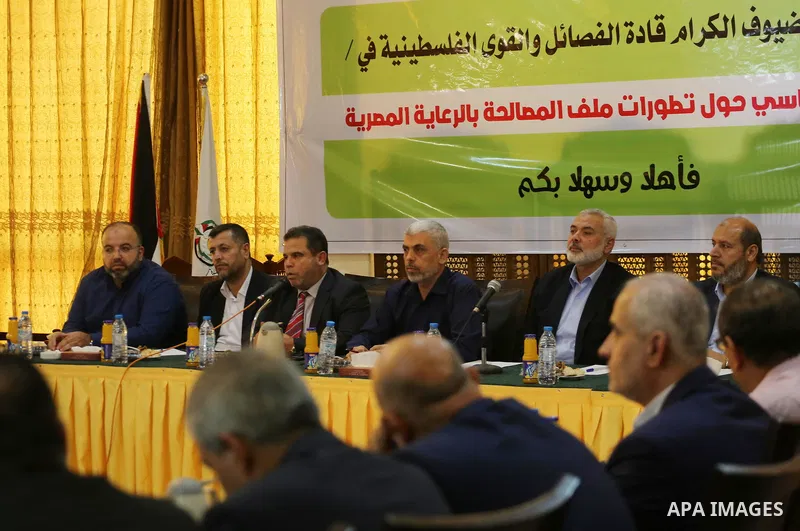 Hamas Chief Ismail Haniyeh and Yahya Sinwar the new leader of the Hamas Islamist movement in the Gaza Strip attend a meeting with leaders of Palestinian factions in Gaza City on September 25, 2017. Photo by Mohammed Asad
