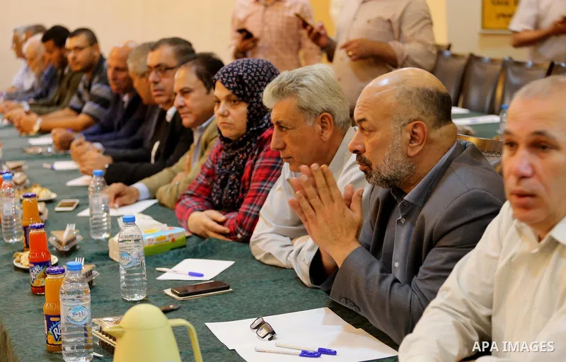 leaders of Palestinian factions attend a meeting with Hamas Chief Ismail Haniyeh and Yahya Sinwar the new leader of the Hamas Islamist movement in the Gaza Strip, in Gaza City on September 25, 2017. Photo by Mohammed Asa...
