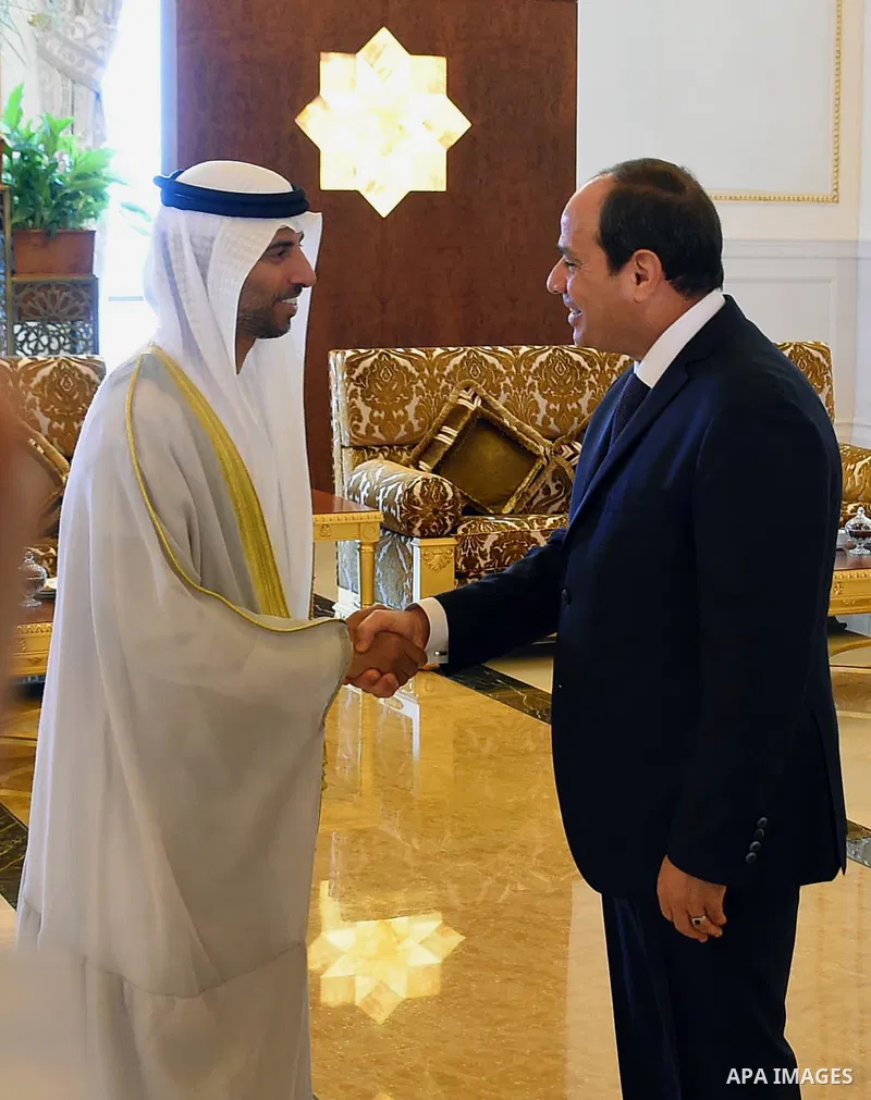 Egyptian President Abdel Fattah al-Sisi shakes hands with UAE Minister of Energy Suhail Mohamed Faraj al-Mazroui in Abu Dhabi on September 25, 2017. Photo by Egyptian President Office