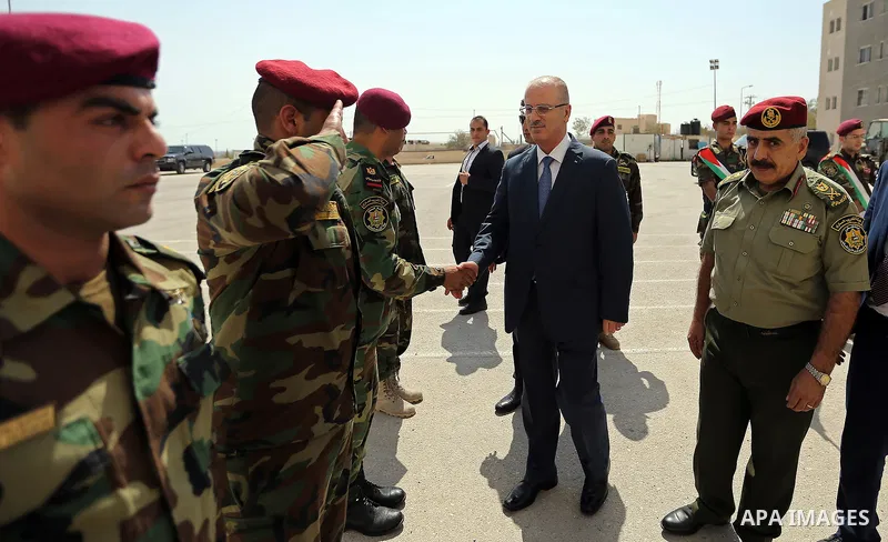 Palestinian Prime Minister Rami Hamdallah arrives to attend the meeting of the security working group at the strategic level, in the West Bank city of Jericho, on September 25, 2017. Photo by Prime Minister Office