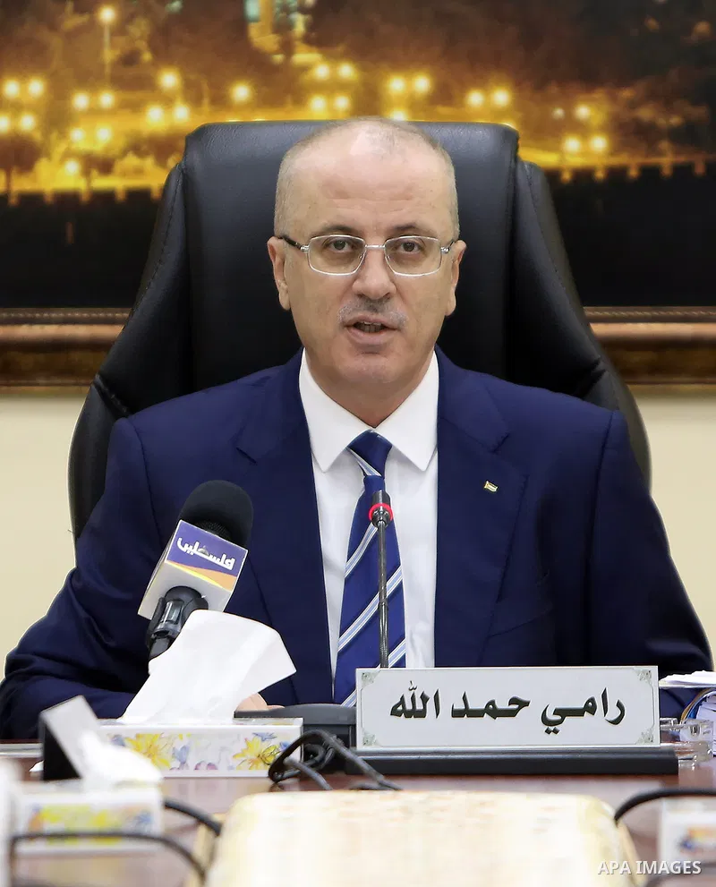 Palestinian Prime Minister, Rami Hamdallah, chairs a meeting of the Council of Ministers, in the West Bank city of Ramallah, on September 26, 217. Photo by Prime Minister Office