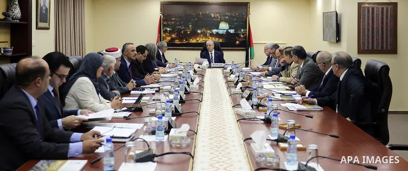 Palestinian Prime Minister, Rami Hamdallah, chairs a meeting of the Council of Ministers, in the West Bank city of Ramallah, on September 26, 217. Photo by Prime Minister Office
