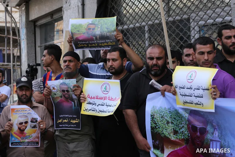 Palestinian supporters of Islamic Jihad celebrate with an attack on a Jewish settlement in the occupied West Bank, in Gaza city on September, 26, 2017. Israeli forces shot dead a Palestinian on Tuesday morning after the...