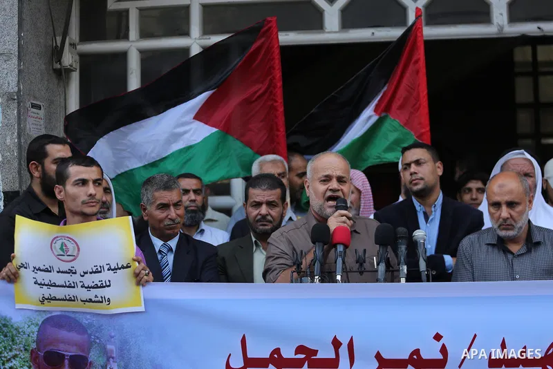 Palestinian supporters of Islamic Jihad celebrate with an attack on a Jewish settlement in the occupied West Bank, in Gaza city on September, 26, 2017. Israeli forces shot dead a Palestinian on Tuesday morning after the...