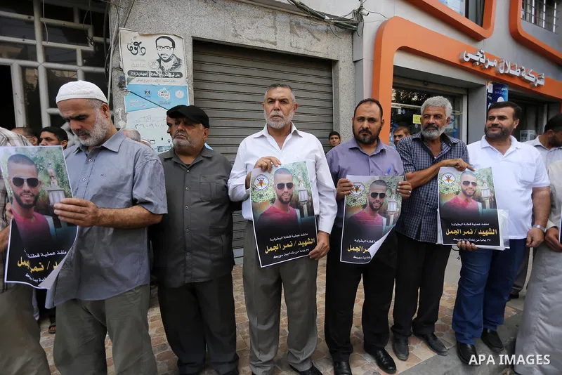 Palestinian supporters of Islamic Jihad celebrate with an attack on a Jewish settlement in the occupied West Bank, in Gaza city on September, 26, 2017. Israeli forces shot dead a Palestinian on Tuesday morning after the...
