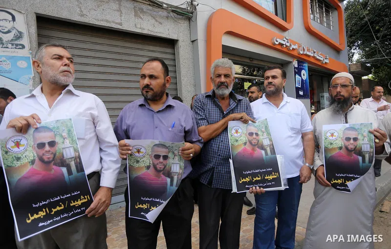 Palestinian supporters of Islamic Jihad celebrate with an attack on a Jewish settlement in the occupied West Bank, in Gaza city on September, 26, 2017. Israeli forces shot dead a Palestinian on Tuesday morning after the...