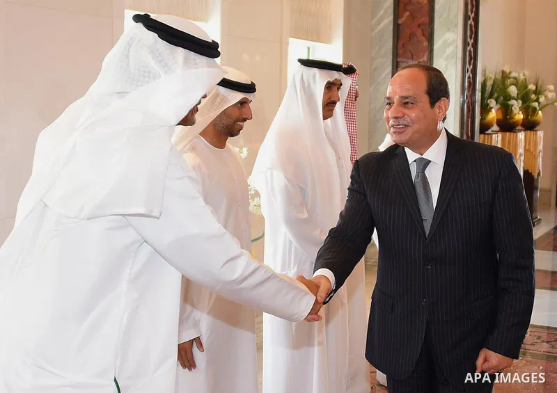 Egyptian President Abdel Fattah al-Sisi shakes hands with UAE officials before he leaves Abu Dhabi, on September 26, 2017. Photo by Egyptian President Office