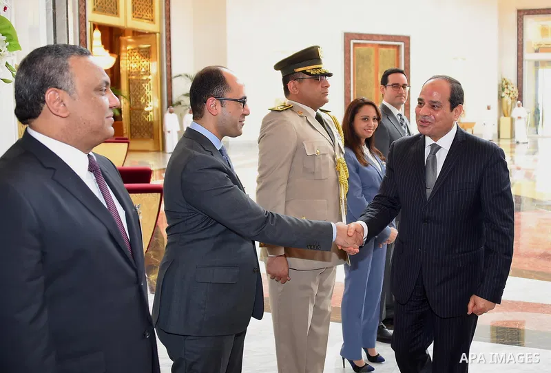Egyptian President Abdel Fattah al-Sisi shakes hands with UAE officials before he leaves Abu Dhabi, on September 26, 2017. Photo by Egyptian President Office