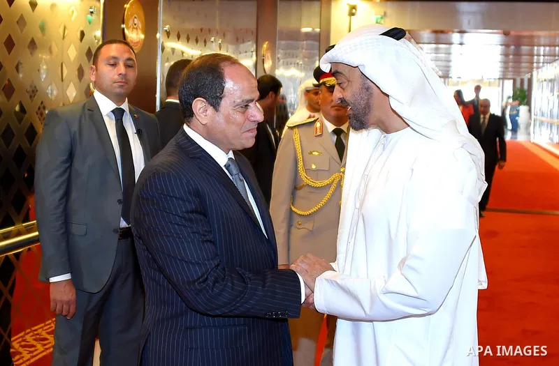 Egyptian President Abdel Fattah al-Sisi shakes hands with Sheikh Mohammed bin Zayed al-Nahyan Crown Prince of Abu Dhabi before he leaves Abu Dhabi, on September 26, 2017. Photo by Egyptian President Office
