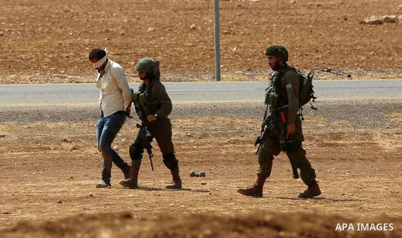 Israeli security forces detain a Palestinian protester during a protest against the expropriation of Palestinian land in the village of Atouf, near the west bank city of Tubas on September 27, 2017. Photo by Ayman Ameen