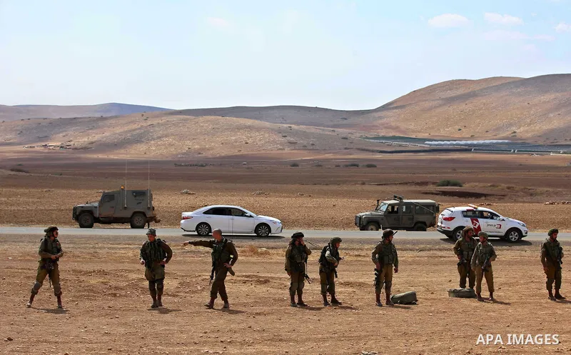 Israeli security froces take position during clashes with Palestinian protesters following a protest against the expropriation of Palestinian land in the village of Atouf, near the west bank city of Tubas on September 27...