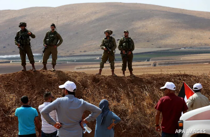 Israeli security froces take position during clashes with Palestinian protesters following a protest against the expropriation of Palestinian land in the village of Atouf, near the west bank city of Tubas on September 27...