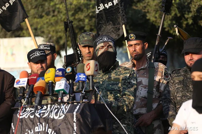 Palestinian militants from the Al-Nasser Brigades, an armed wing of the Popular Resistance Committees (PRC), take part in a military parade, in Gaza city, on September 29, 2017, to mark the 17th anniversary of the creati...