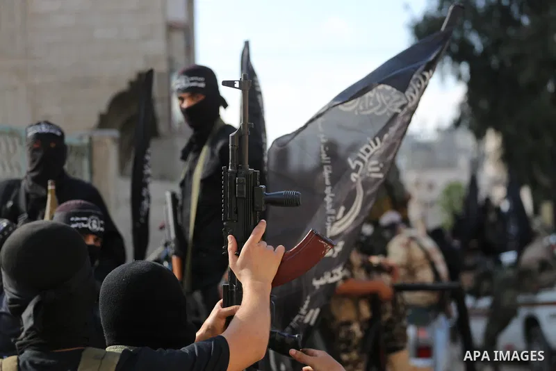 Palestinian militants from the Al-Nasser Brigades, an armed wing of the Popular Resistance Committees (PRC), take part in a military parade, in Gaza city, on September 29, 2017, to mark the 17th anniversary of the creati...