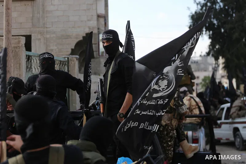 Palestinian militants from the Al-Nasser Brigades, an armed wing of the Popular Resistance Committees (PRC), take part in a military parade, in Gaza city, on September 29, 2017, to mark the 17th anniversary of the creati...