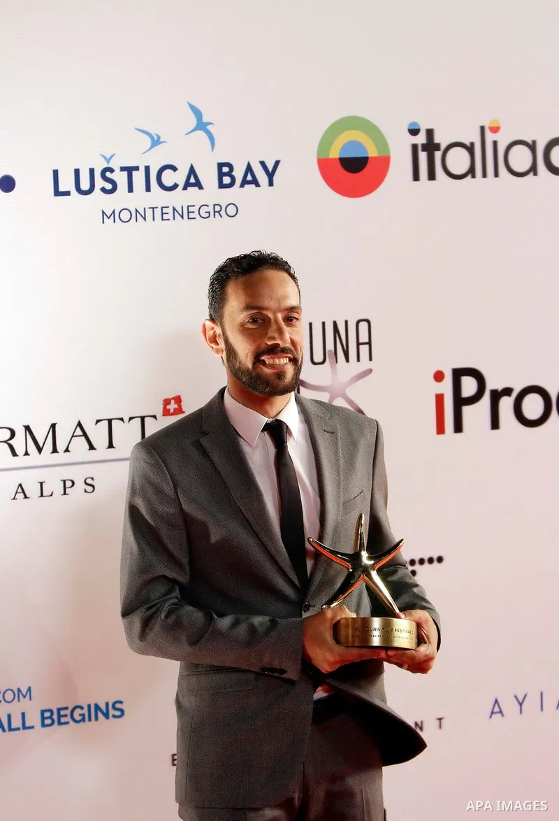 Egyptian filmmaker Mohamed Zaydan poses with his Best Arab Feature Documentary award during the closing ceremony of the El-Gouna Film Festival, in the Red Sead resort of El-Gouna in Egypt, on September 29, 2017. Photo by...