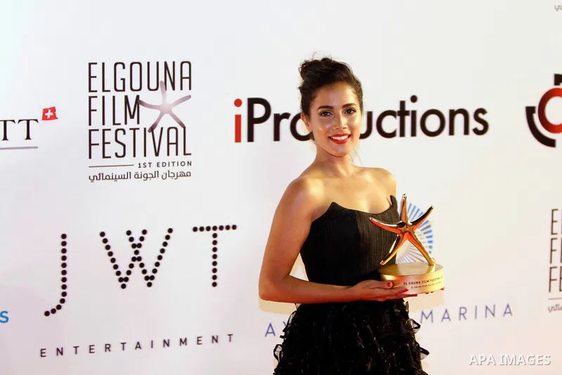 Moroccan actress Nadia Kounda poses with her Best Actress award for her role in Volubilis during the closing ceremony of the El-Gouna Film Festival, in the Red Sead resort of El-Gouna in Egypt, on September 29, 2017. Pho...