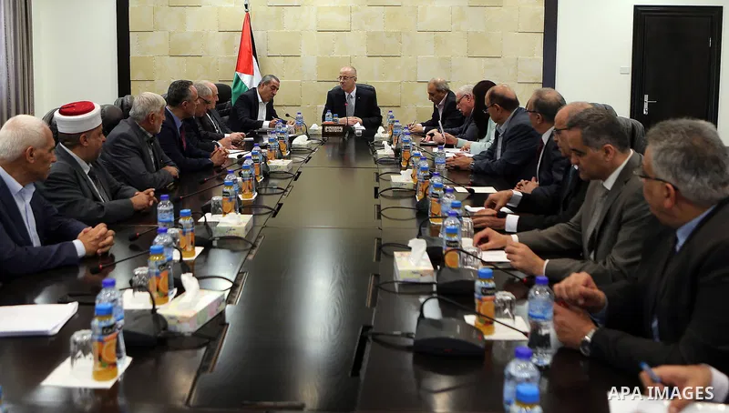 Palestinian Prime Minister, Rami hamdallah, chairs a Ministerial meeting in the West Bank city of Ramallah on October 1, 2017. Photo by Prime Minister Office