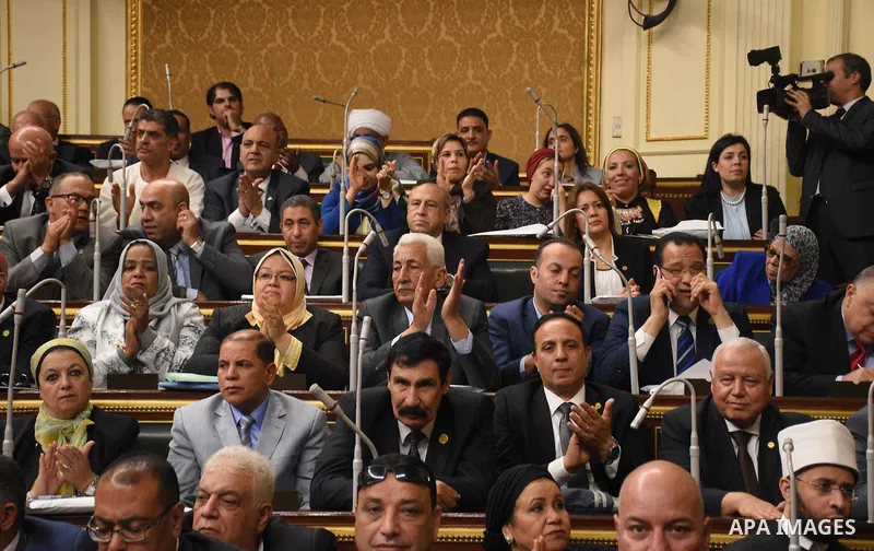 Egyptian parliament members attend a meeting of the opening session of the Parliament, in Cairo, Egypt, on October 2, 2017. Photo by Stringer