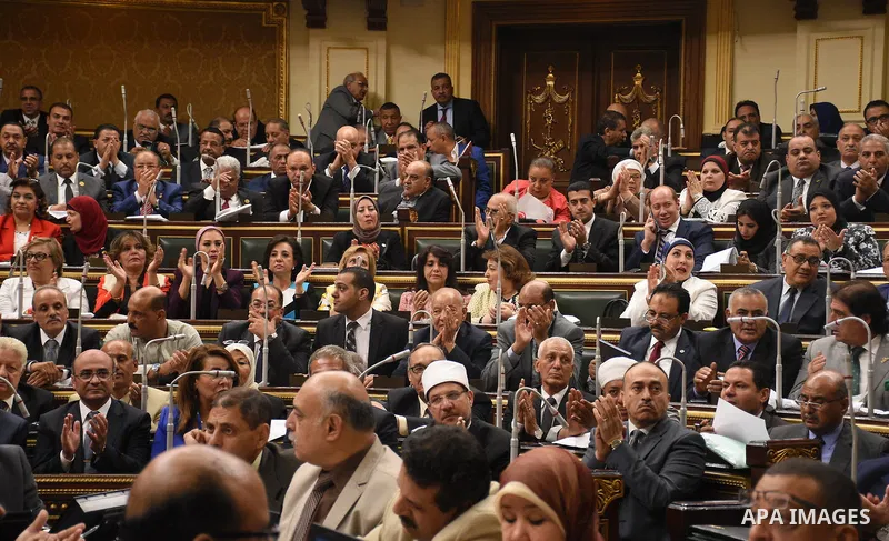 Egyptian parliament members attend a meeting of the opening session of the Parliament, in Cairo, Egypt, on October 2, 2017. Photo by Stringer