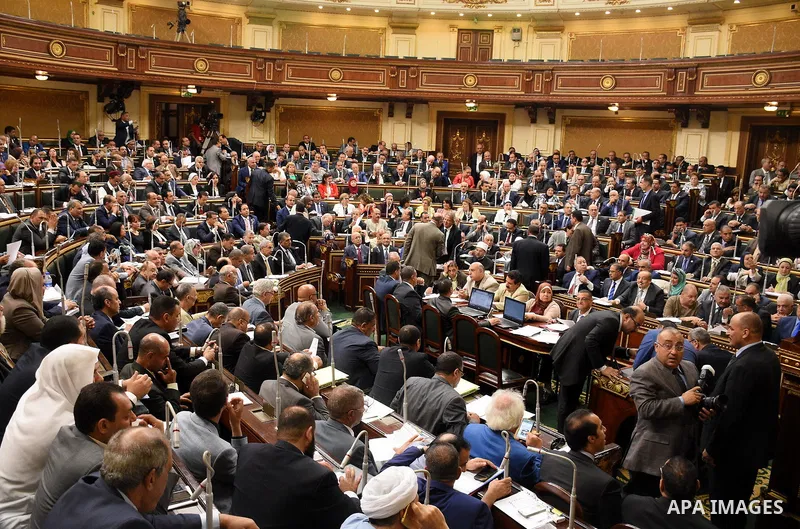 Egyptian parliament members attend a meeting of the opening session of the Parliament, in Cairo, Egypt, on October 2, 2017. Photo by Stringer