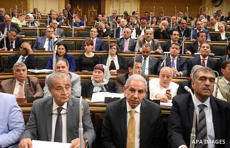Egyptian parliament members attend a meeting of the opening session of the Parliament, in Cairo, Egypt, on October 2, 2017. Photo by Stringer