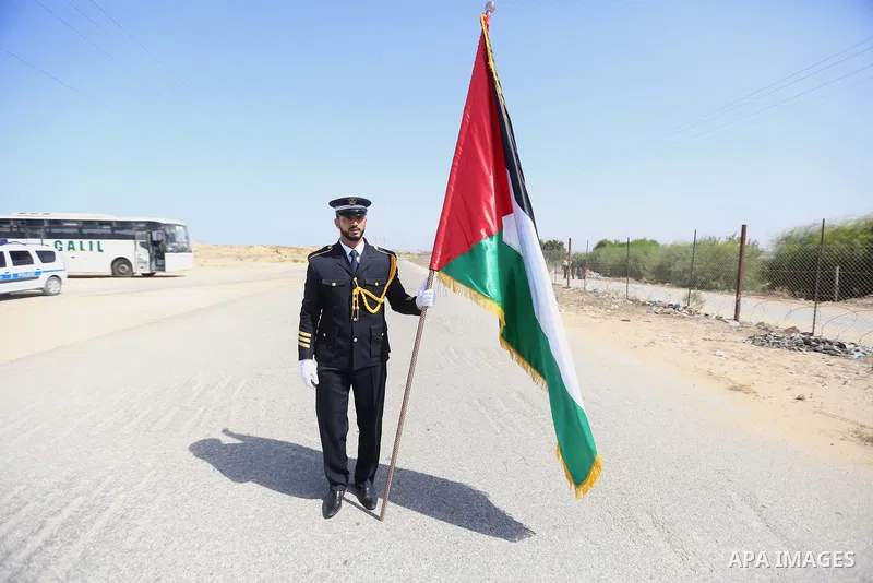 Palestinian honor guards as they wait for the arrival of Palestinian Prime Minister Rami Hamdallah and his government at Erez crossing in the northern Gaza Strip, on October 2, 2017. Hamdallah is on on his first visit to...