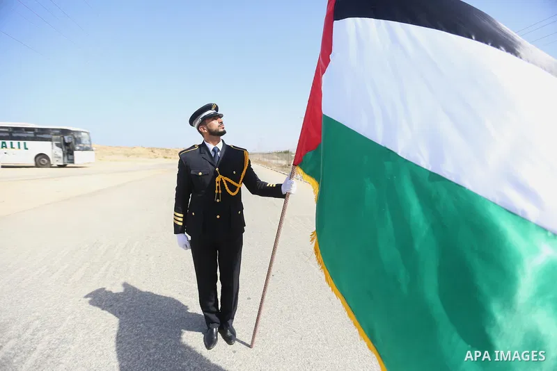 Palestinian honor guards as they wait for the arrival of Palestinian Prime Minister Rami Hamdallah and his government at Erez crossing in the northern Gaza Strip, on October 2, 2017. Hamdallah is on on his first visit to...