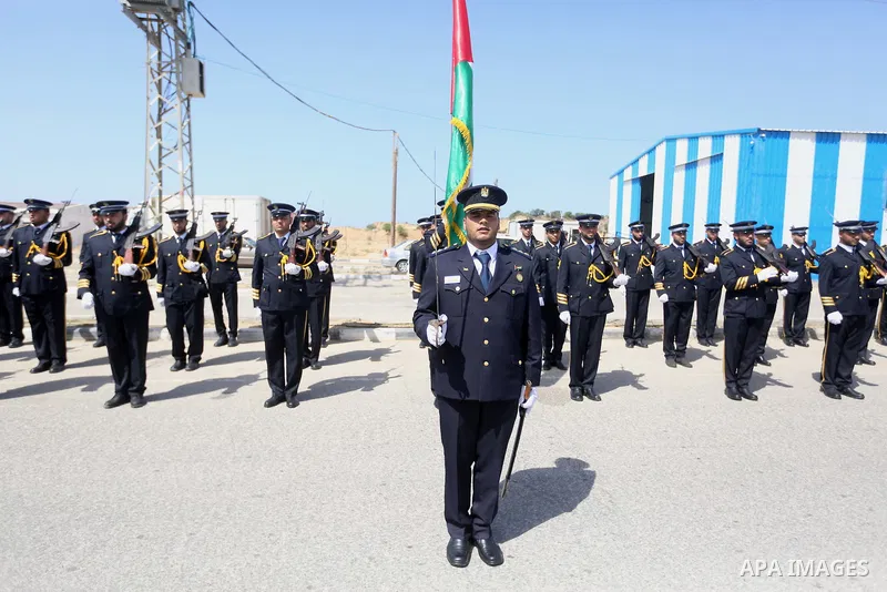 Palestinian honor guards as they wait for the arrival of Palestinian Prime Minister Rami Hamdallah and his government at Erez crossing in the northern Gaza Strip, on October 2, 2017. Hamdallah is on on his first visit to...