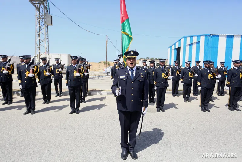Palestinian honor guards as they wait for the arrival of Palestinian Prime Minister Rami Hamdallah and his government at Erez crossing in the northern Gaza Strip, on October 2, 2017. Hamdallah is on on his first visit to...