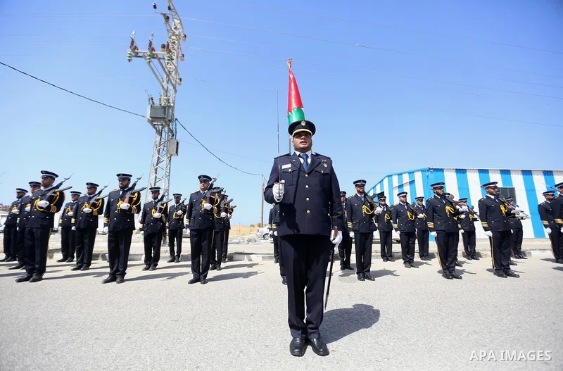 Palestinian honor guards as they wait for the arrival of Palestinian Prime Minister Rami Hamdallah and his government at Erez crossing in the northern Gaza Strip, on October 2, 2017. Hamdallah is on on his first visit to...