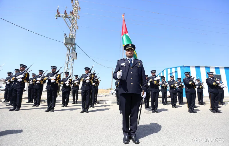 Palestinian honor guards as they wait for the arrival of Palestinian Prime Minister Rami Hamdallah and his government at Erez crossing in the northern Gaza Strip, on October 2, 2017. Hamdallah is on on his first visit to...
