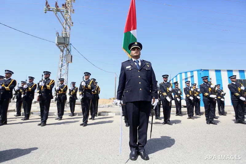 Palestinian honor guards as they wait for the arrival of Palestinian Prime Minister Rami Hamdallah and his government at Erez crossing in the northern Gaza Strip, on October 2, 2017. Hamdallah is on on his first visit to...