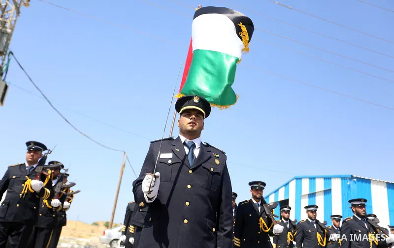 Palestinian honor guards as they wait for the arrival of Palestinian Prime Minister Rami Hamdallah and his government at Erez crossing in the northern Gaza Strip, on October 2, 2017. Hamdallah is on on his first visit to...
