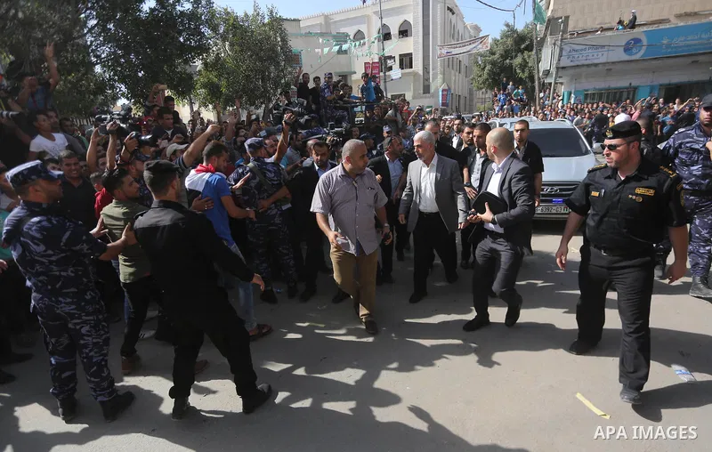 Leader of the Hamas Islamist movement, Yahya Sinwar in the Gaza Strip arrives to meeting with Palestinian Prime Minister Rami Hamdallah at the house of Ahmed Hilles, top Fatah official in Gaza city on October 2, 2017. Ha...
