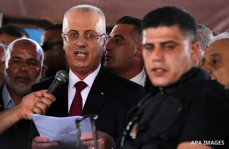Palestinian Prime Minister Rami Hamdallah makes a statement after his arrival at the Erez border crossing in the northern Gaza Strip on October 2, 2017. Palestinian prime minister Rami Hamdallah arrived in Gaza for his f...