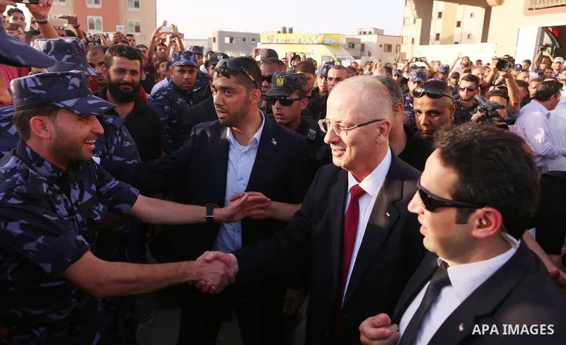 Palestinian Prime Minister Rami Hamdallah visits the Shejaiya neighborhood in Gaza City on October 2, 2017. Palestinian prime minister Rami Hamdallah arrived in Gaza for his first visit in two years, saying the Palestini...