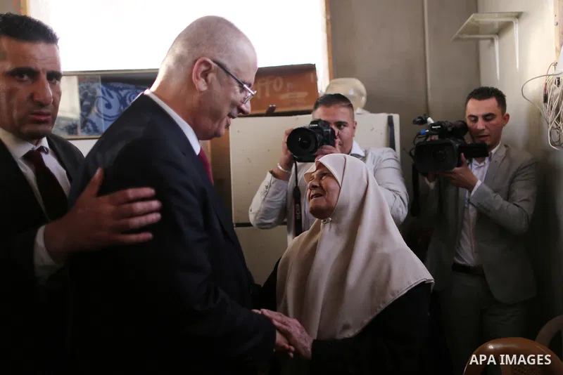 Palestinian Prime Minister Rami Hamdallah visits a house of Palestinian family at Shejaiya neighborhood in Gaza City on October 2, 2017. Palestinian prime minister Rami Hamdallah arrived in Gaza for his first visit in tw...