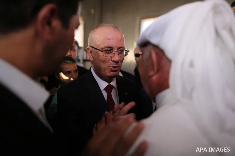 Palestinian Prime Minister Rami Hamdallah visits a house of Palestinian family at Shejaiya neighborhood in Gaza City on October 2, 2017. Palestinian prime minister Rami Hamdallah arrived in Gaza for his first visit in tw...